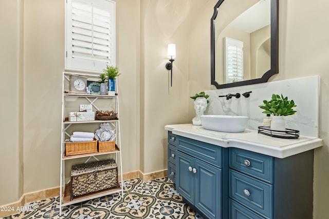 bathroom with vanity and a healthy amount of sunlight