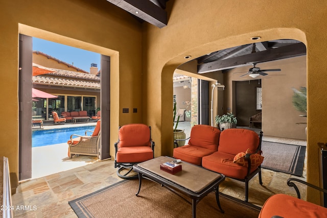 view of patio with an outdoor hangout area and ceiling fan