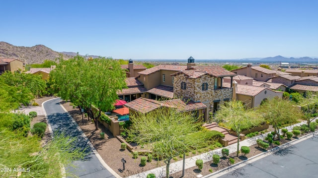 bird's eye view with a mountain view