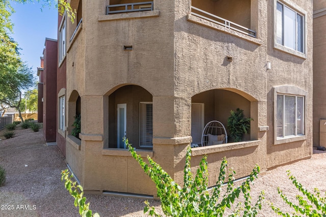 5401 E Van Buren St Unit 1088, Phoenix, AZ 85008 - view of side of home with stucco siding