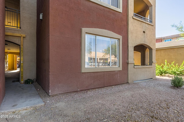 5401 E Van Buren St Unit 1088, Phoenix, AZ 85008 - view of side of property featuring stucco siding