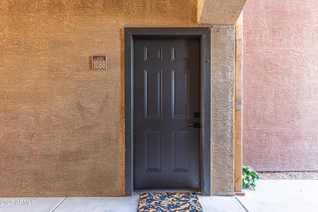 5401 E Van Buren St Unit 1088, Phoenix, AZ 85008 - view of exterior entry with stucco siding