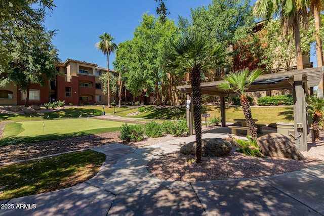 5401 E Van Buren St Unit 1088, Phoenix, AZ 85008 - surrounding community featuring a putting area and a pergola