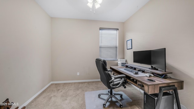 office area featuring a ceiling fan, carpet flooring, and baseboards