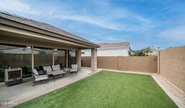view of yard with a patio area and an outdoor living space