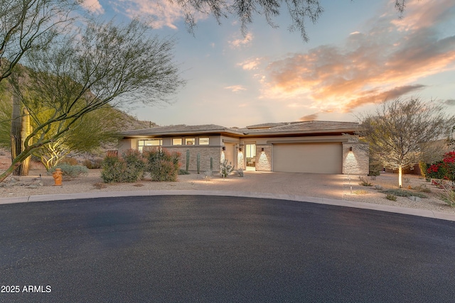 prairie-style home with a garage