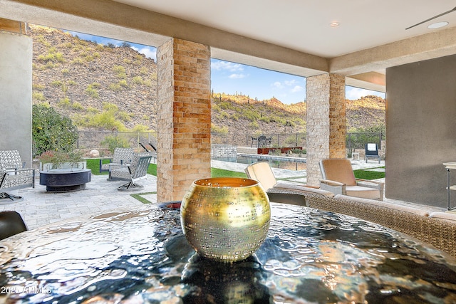 view of patio with a mountain view