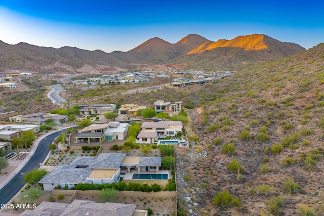 drone / aerial view featuring a mountain view