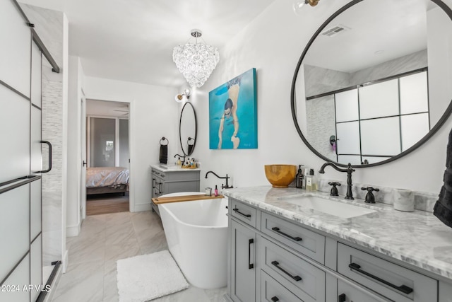 bathroom featuring independent shower and bath and vanity