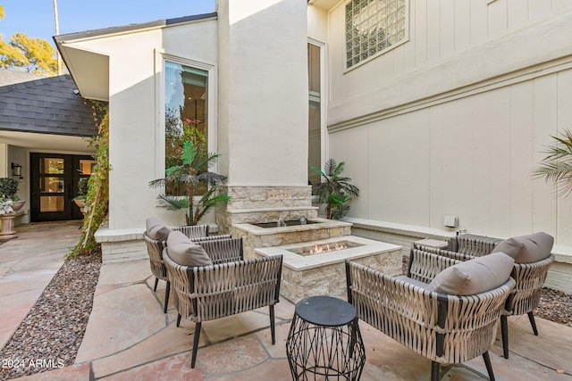 view of patio / terrace with a fire pit