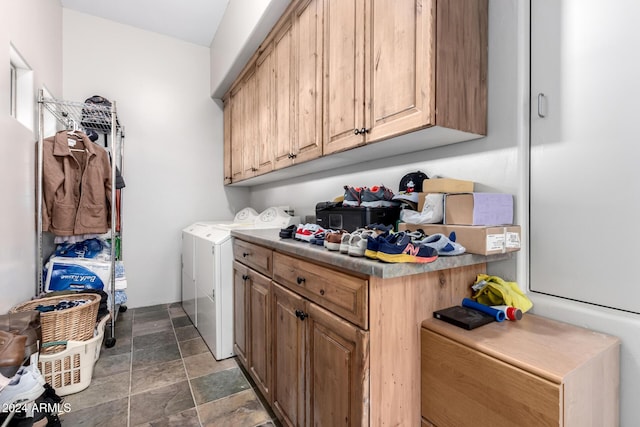 washroom with cabinets and independent washer and dryer