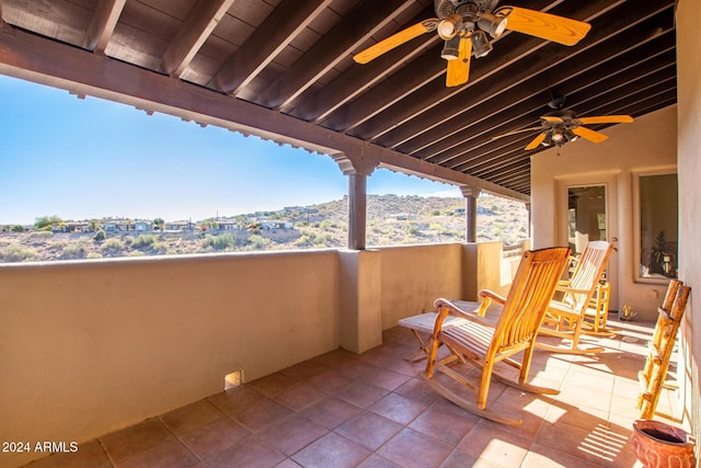 view of patio with a balcony