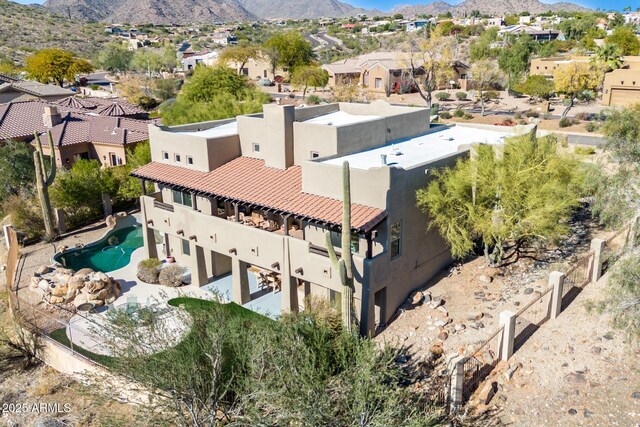 15155 E Westridge Dr, Fountain Hills, AZ 85268 - aerial perspective of suburban area featuring a mountain backdrop and a pool