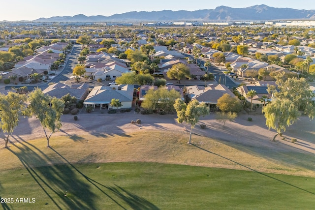 birds eye view of property featuring a mountain view