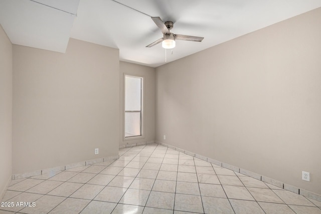 6818 N 35th Ave Unit C, Phoenix, AZ 85017 - unfurnished room with ceiling fan, light tile patterned floors, and baseboards