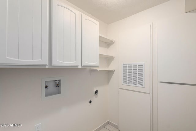 6818 N 35th Ave Unit C, Phoenix, AZ 85017 - washroom featuring cabinet space, hookup for a washing machine, baseboards, a textured ceiling, and hookup for an electric dryer