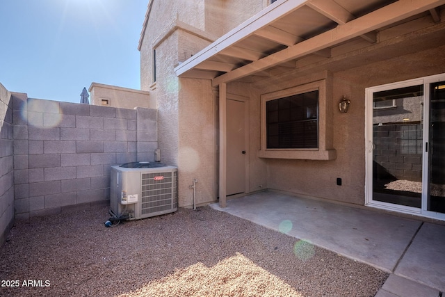 view of patio with cooling unit