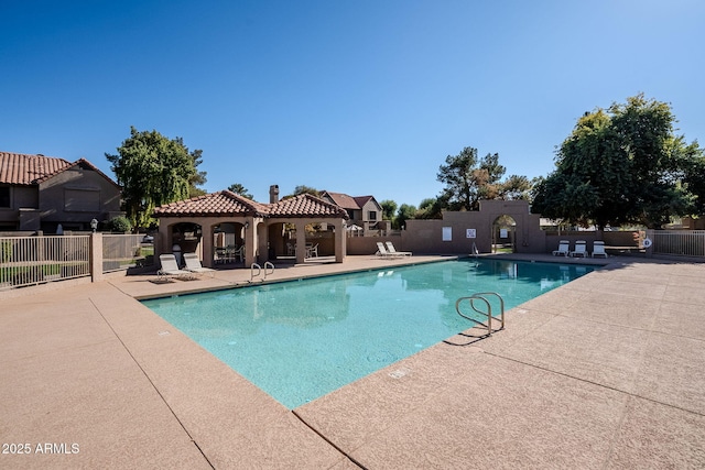 view of swimming pool featuring a patio