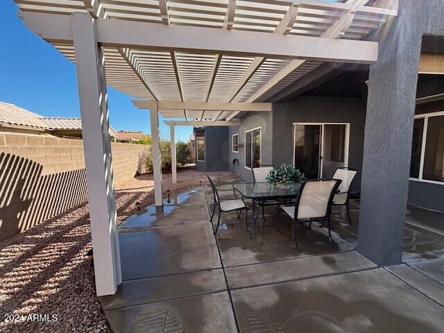 view of patio featuring a pergola