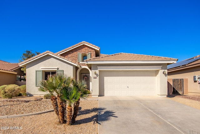 view of front of home featuring a garage