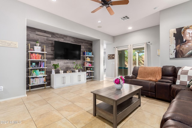 living room with light tile patterned flooring and ceiling fan