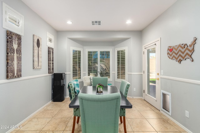 dining area featuring light tile patterned floors