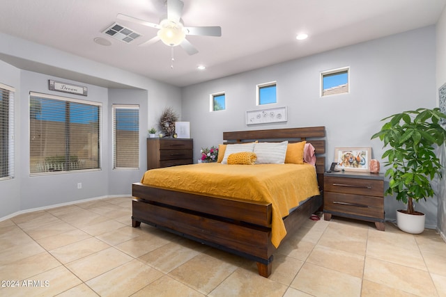 bedroom with light tile patterned floors and ceiling fan