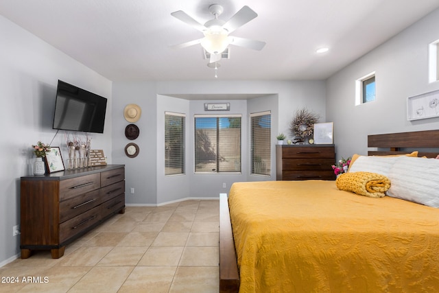 bedroom featuring light tile patterned floors and ceiling fan