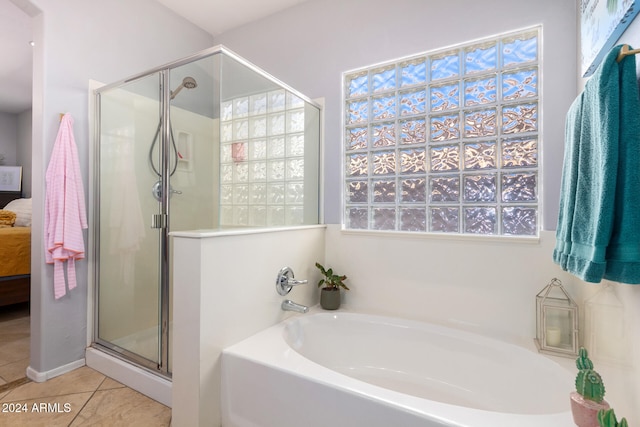 bathroom with plus walk in shower and tile patterned floors