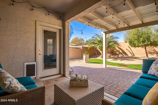 view of patio / terrace with outdoor lounge area and a pergola