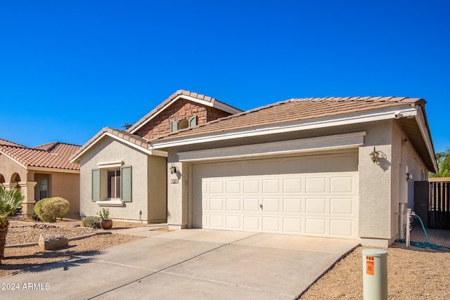 view of front of property featuring a garage