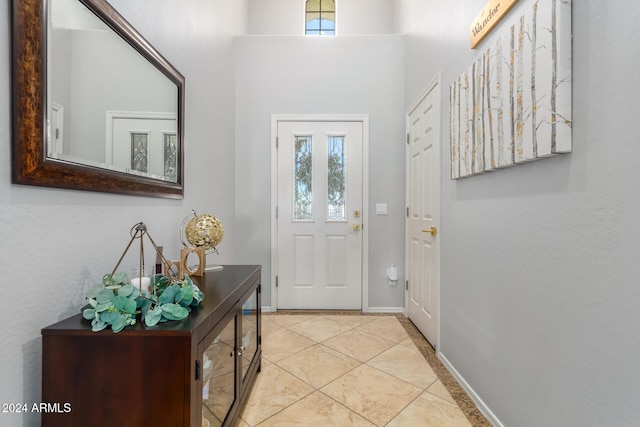 foyer with light tile patterned floors