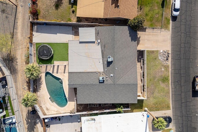 drone / aerial view of a pool