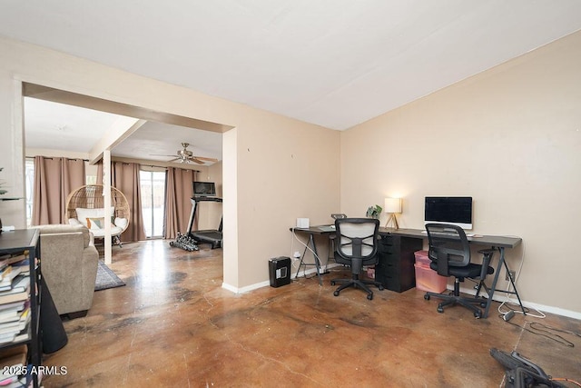office area featuring baseboards, finished concrete floors, and ceiling fan