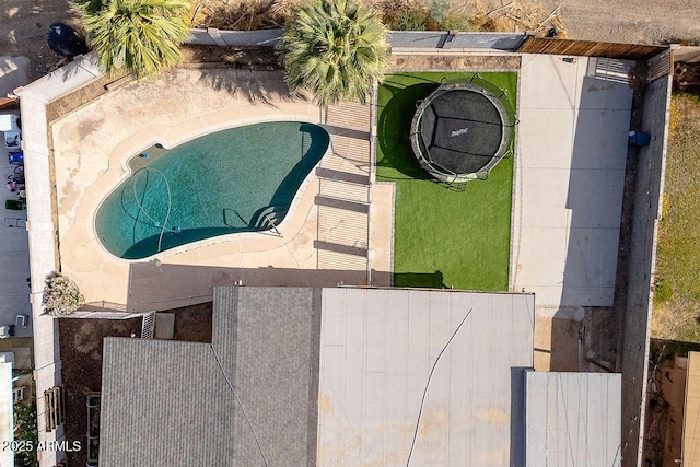 view from above of property featuring a pool area