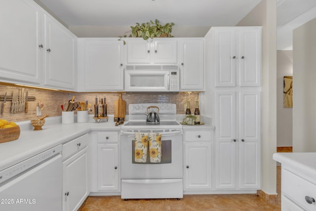 kitchen featuring white cabinetry, white appliances, light countertops, and tasteful backsplash