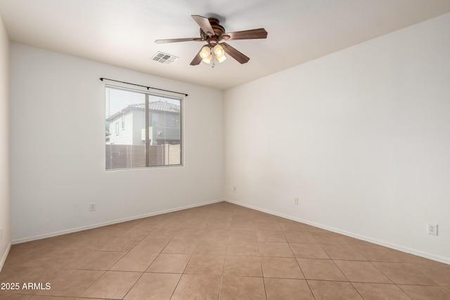 8848 W Cordes Rd, Tolleson, AZ 85353 - unfurnished room with ceiling fan, baseboards, and light tile patterned flooring