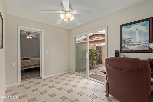 interior space featuring ceiling fan