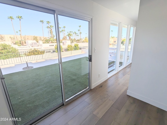 doorway to outside featuring hardwood / wood-style flooring