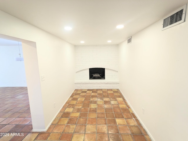 basement featuring a fireplace