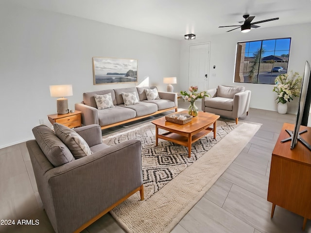 living room with ceiling fan