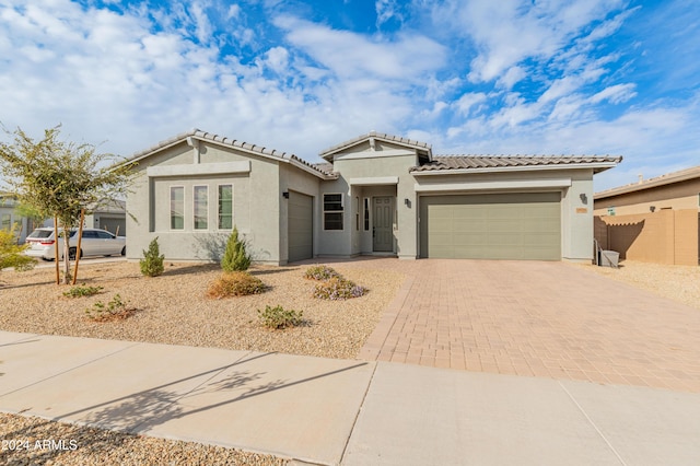 view of front of property featuring a garage