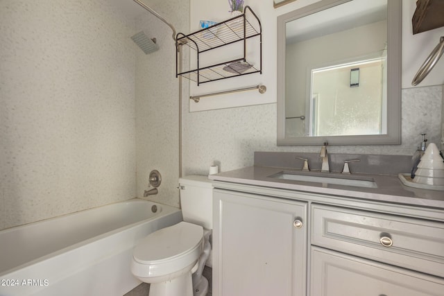 full bathroom with shower / bath combination, vanity, and toilet