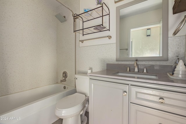 7394 N 67th Dr, Glendale, AZ 85303 - full bathroom with toilet, vanity, and tub / shower combination