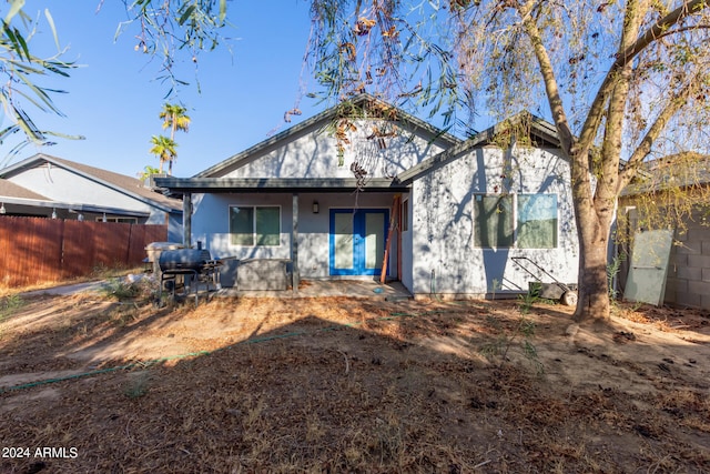 rear view of house featuring a patio area