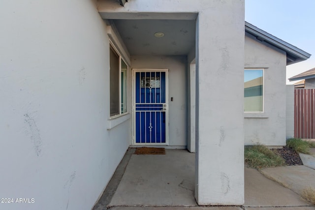 7394 N 67th Dr, Glendale, AZ 85303 - property entrance with stucco siding and fence
