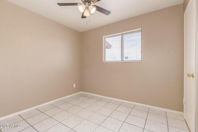 12547 W Warner St, Avondale, AZ 85323 - spare room featuring ceiling fan, baseboards, and light tile patterned floors