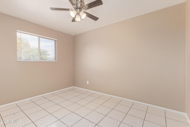12547 W Warner St, Avondale, AZ 85323 - empty room featuring baseboards, a ceiling fan, and light tile patterned flooring