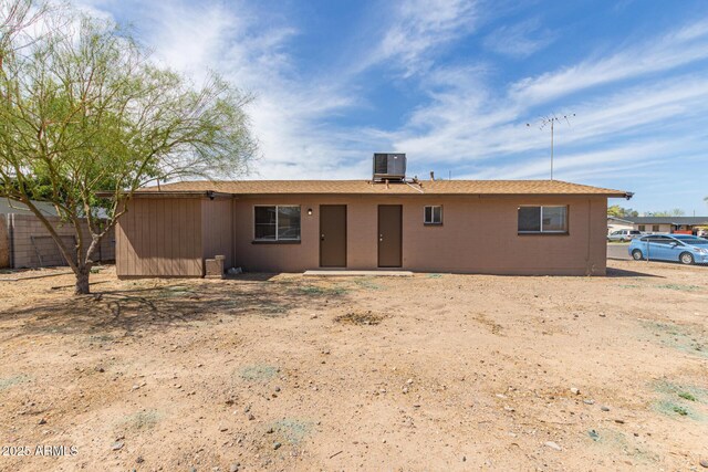 12547 W Warner St, Avondale, AZ 85323 - rear view of property with central air condition unit