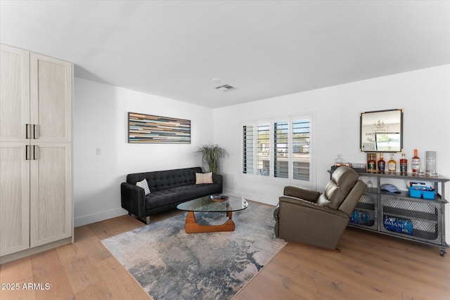 living room with hardwood / wood-style floors